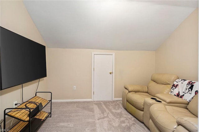 living room with vaulted ceiling and light carpet