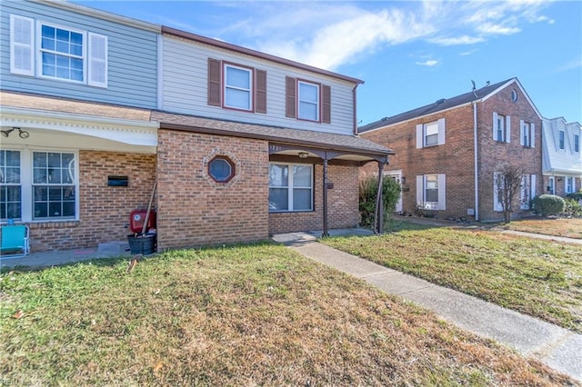 view of front of home with a front lawn