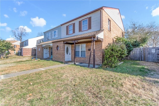 front facade with a front yard