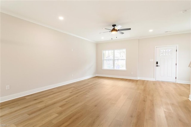 unfurnished living room with ornamental molding, ceiling fan, and light hardwood / wood-style flooring