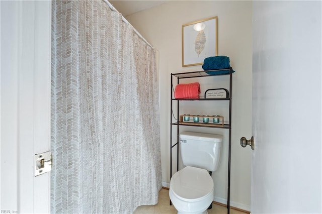 bathroom featuring toilet