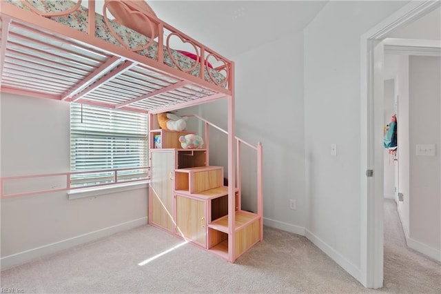 bedroom featuring carpet flooring