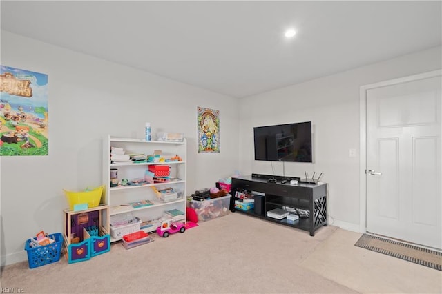 rec room with carpet flooring