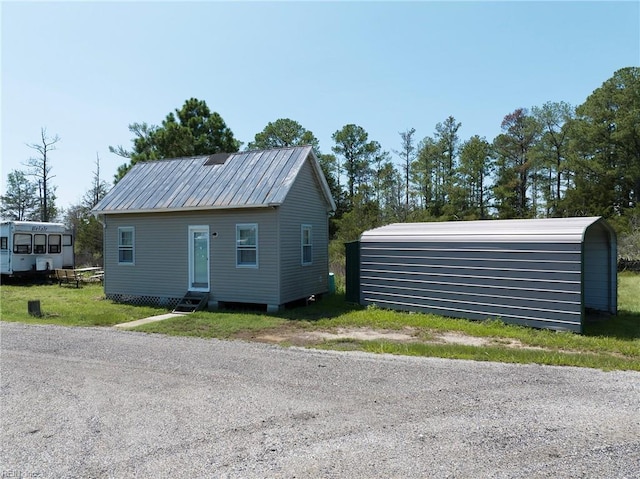 exterior space with a carport