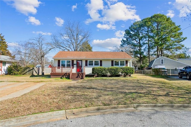 single story home featuring a front yard