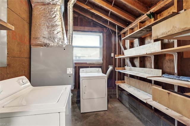 clothes washing area with washer and dryer