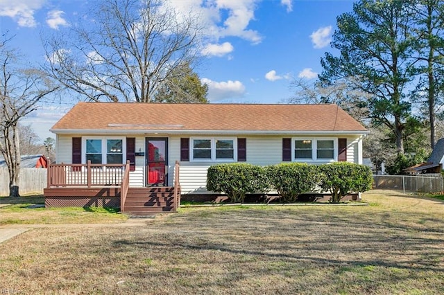 ranch-style home with a front lawn