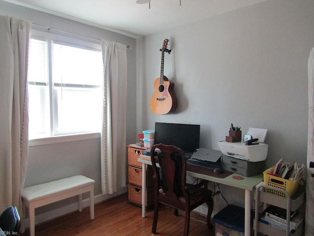 office area with hardwood / wood-style flooring and ceiling fan