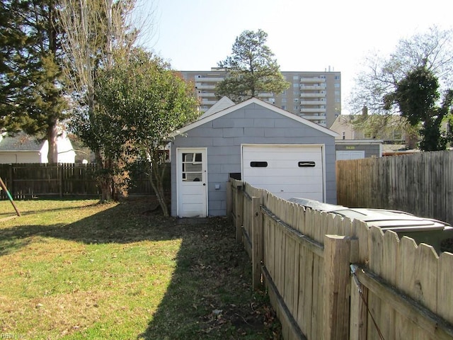 garage with a lawn