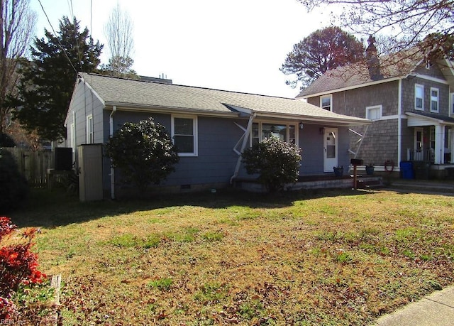 view of front facade featuring a front yard and a porch