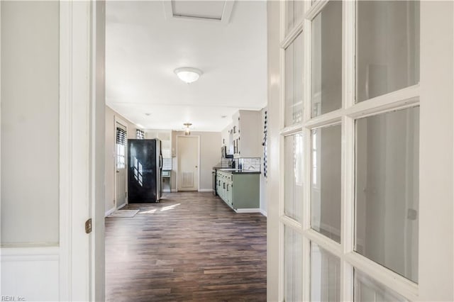 hall featuring dark wood-type flooring