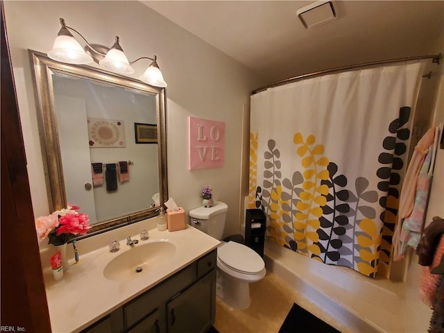 full bathroom featuring vanity, shower / bath combination with curtain, and toilet