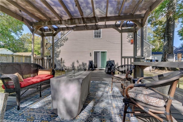 view of patio / terrace with outdoor lounge area, a pergola, and a deck