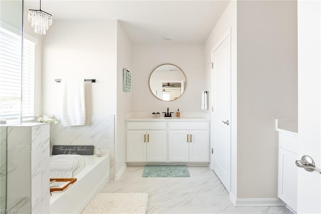 bathroom featuring vanity and an inviting chandelier