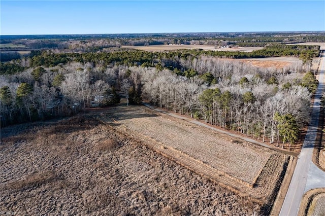 birds eye view of property with a rural view