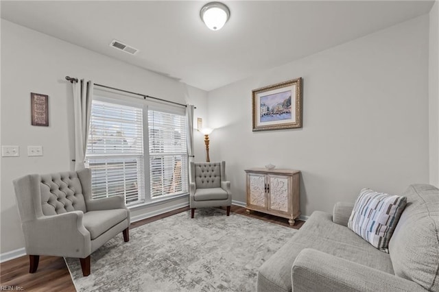 living area featuring hardwood / wood-style flooring