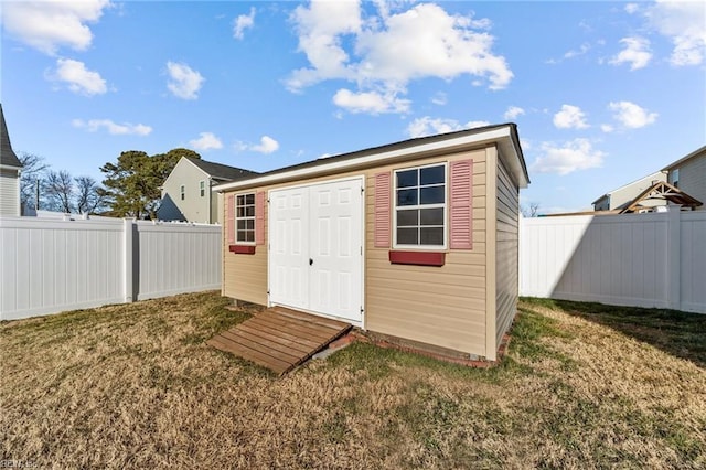 view of outdoor structure with a lawn