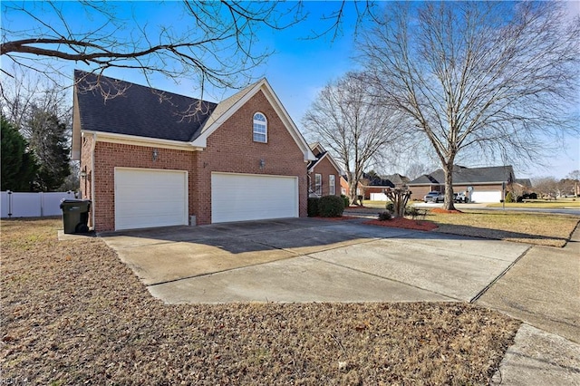 view of property exterior with a garage