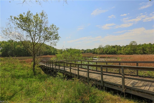 wooden terrace with a rural view