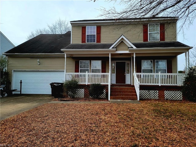 view of front of house with a garage and a porch