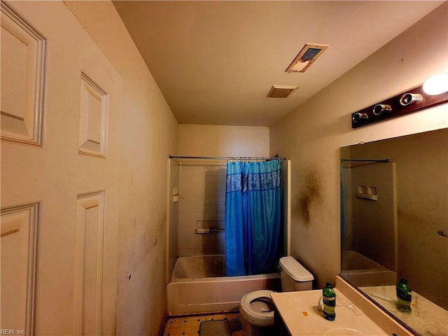 full bathroom with vanity, toilet, and shower / bath combo with shower curtain