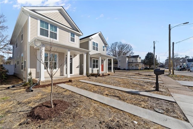 view of front of property featuring covered porch