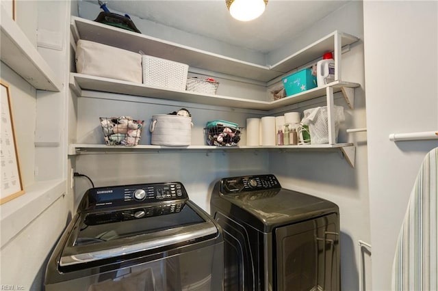 laundry room featuring washing machine and dryer