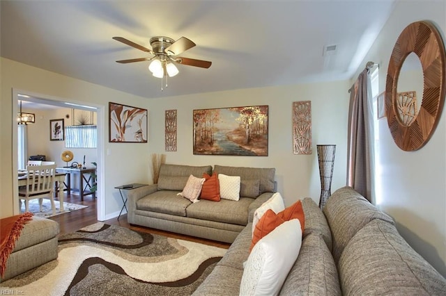 living room with hardwood / wood-style floors and ceiling fan