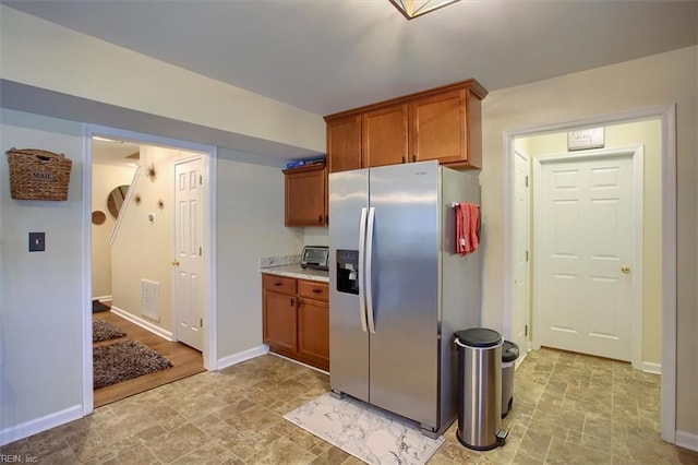 kitchen with stainless steel fridge