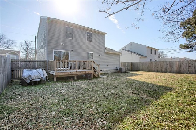 back of house featuring a yard, cooling unit, and a deck