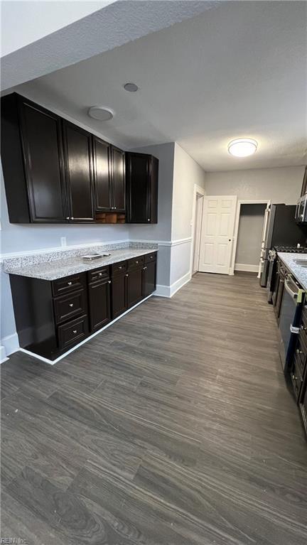 kitchen featuring dark hardwood / wood-style floors