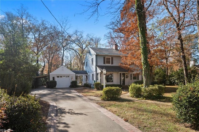 view of front property with a carport and a front yard