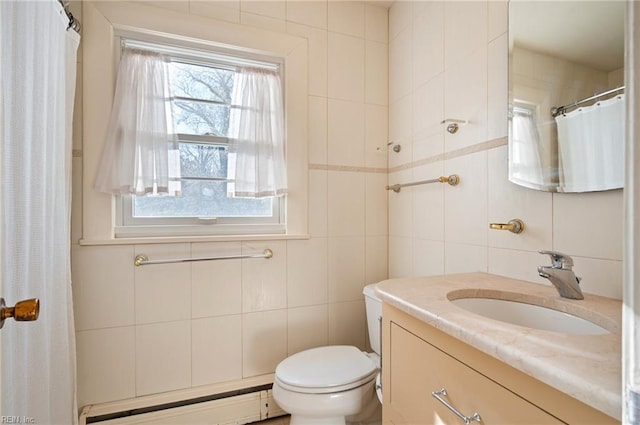 bathroom with toilet, tasteful backsplash, tile walls, a baseboard radiator, and vanity