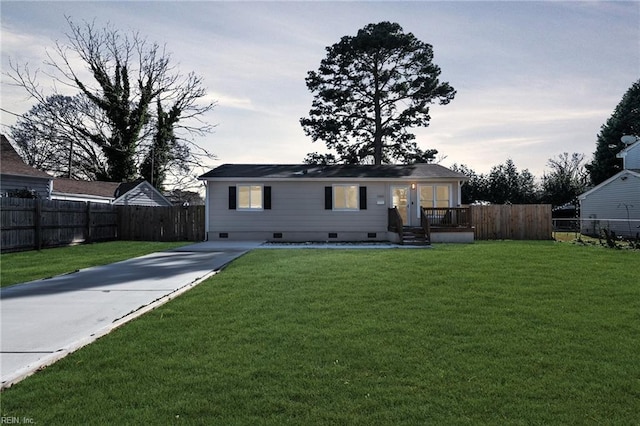 ranch-style house with a front lawn