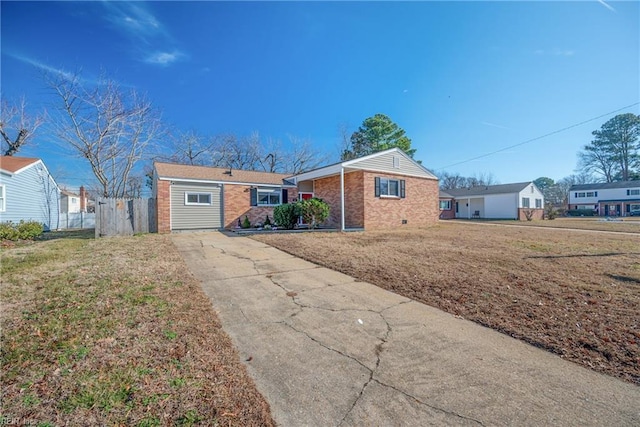 ranch-style house with a front yard