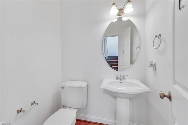 bathroom featuring toilet