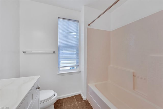 full bathroom with vanity,  shower combination, tile patterned floors, and toilet