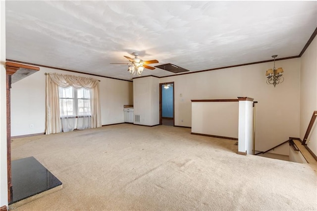 unfurnished living room featuring ornamental molding, light colored carpet, and ceiling fan