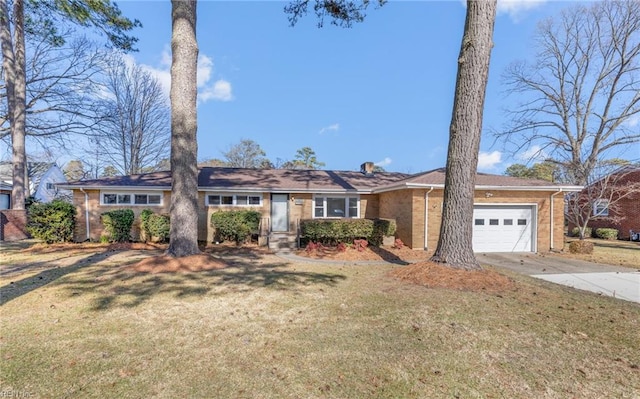 ranch-style home with a garage and a front yard