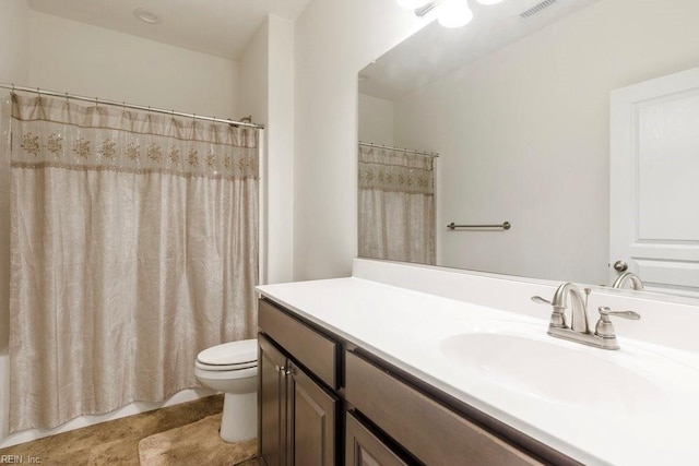 full bathroom with vanity, shower / bathtub combination with curtain, and toilet