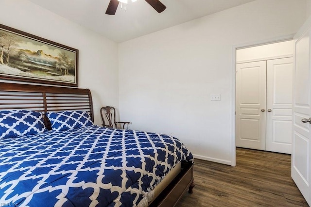 bedroom featuring ceiling fan and dark hardwood / wood-style floors