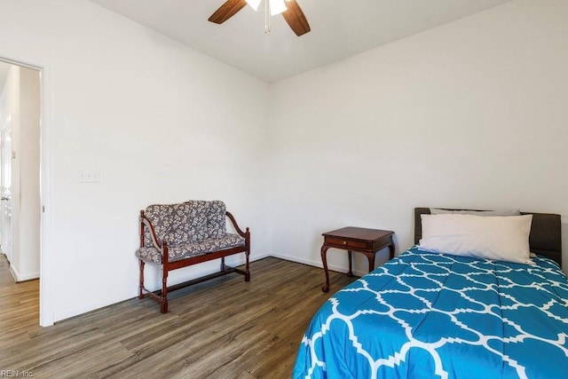 bedroom with ceiling fan and hardwood / wood-style floors