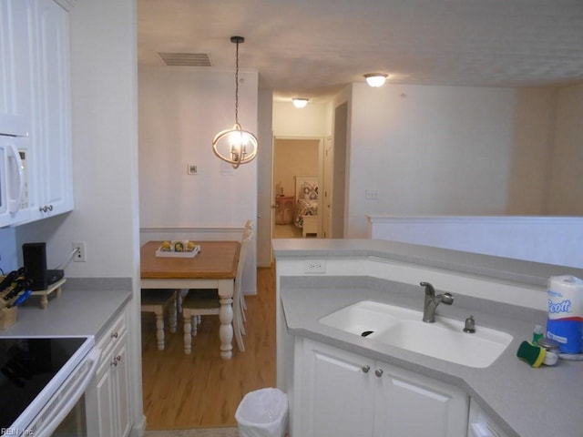 bathroom featuring sink and hardwood / wood-style floors