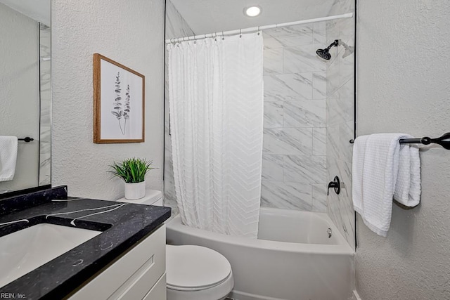 full bathroom featuring vanity, shower / bath combination with curtain, and toilet