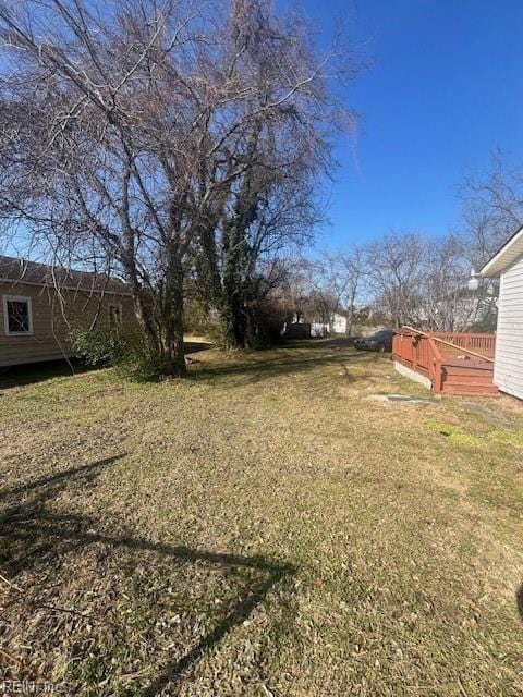 view of yard featuring a deck