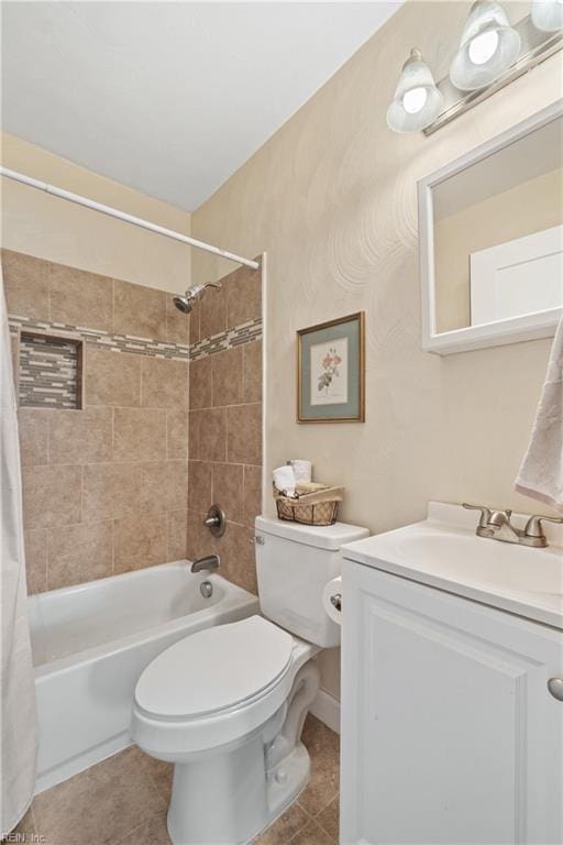 full bathroom with shower / bath combination with curtain, tile patterned floors, toilet, and vanity