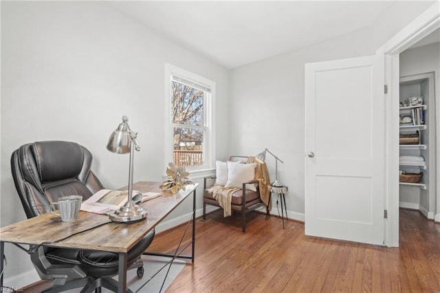 office space with hardwood / wood-style flooring