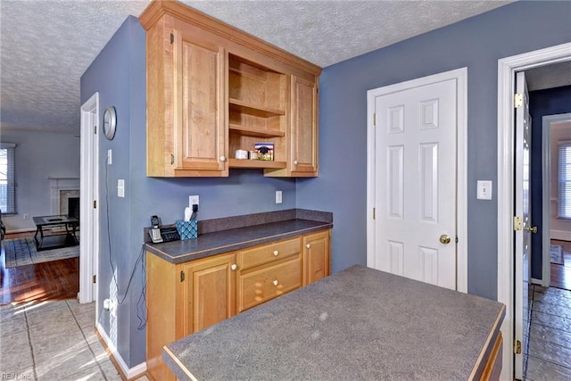 kitchen featuring a textured ceiling