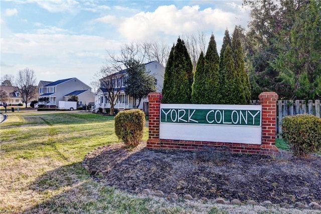 community sign with a lawn