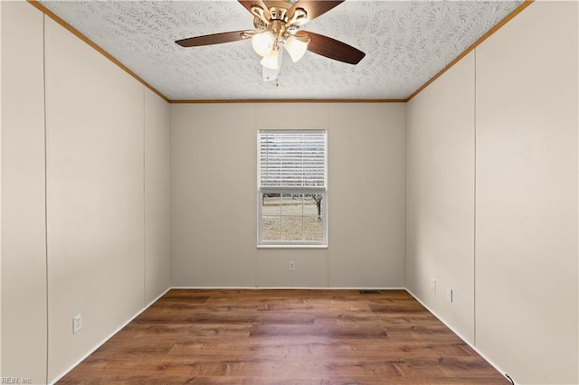 empty room with crown molding, ceiling fan, a textured ceiling, and hardwood / wood-style flooring